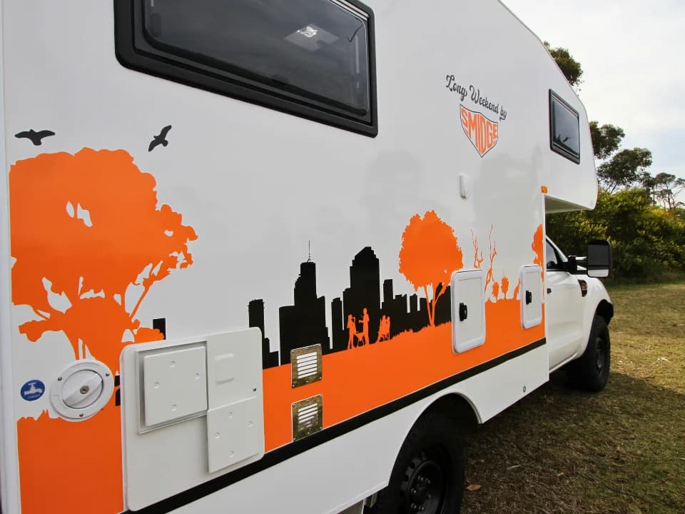 2026 Made by Smidge Long Weekend — rear three-quarter view showing the full motorhome length of 5.8m