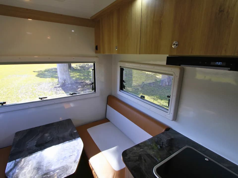 2026 Made by Smidge Long Weekend — convertible seating showing flexibility of the interior layout