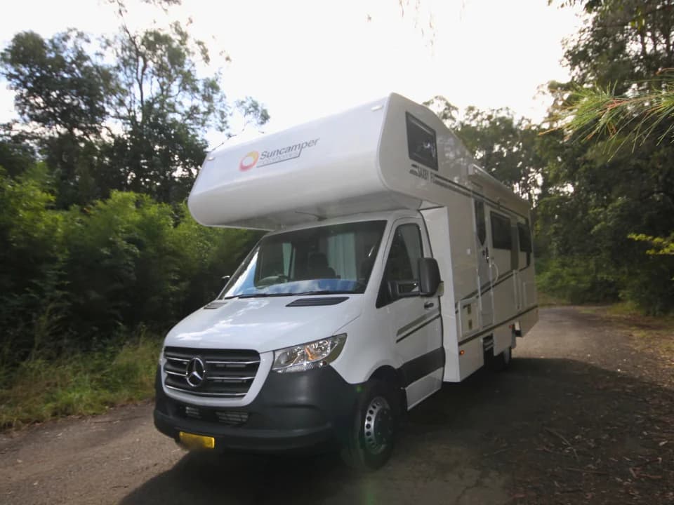 Saxby F-2 front exterior — Suncamper Motorhomes nosecone branding
