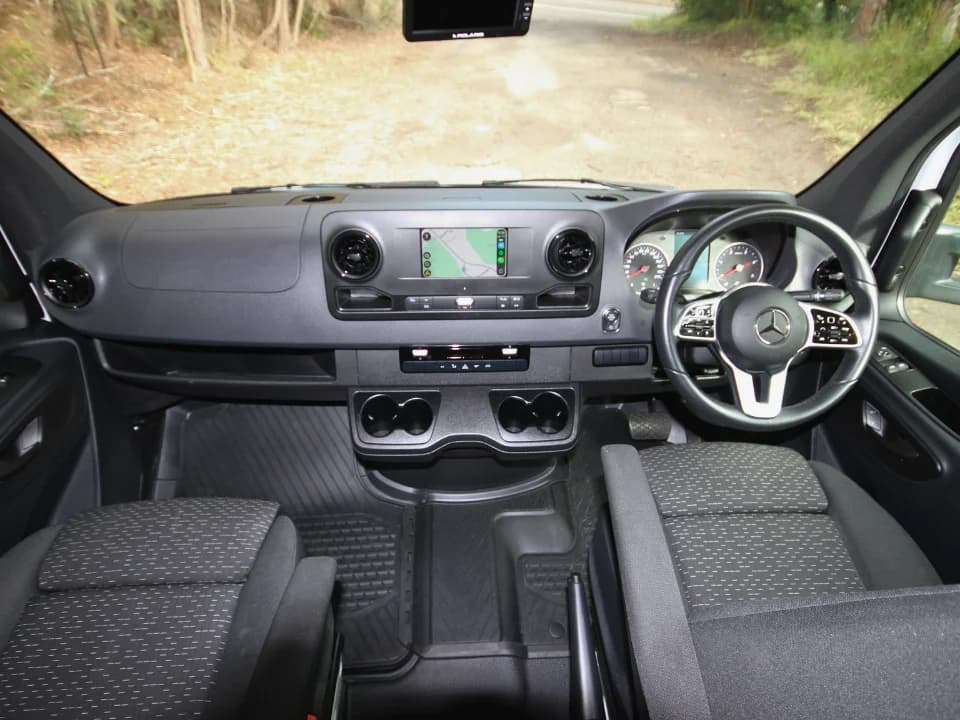 Mercedes-Benz Sprinter 519 cab interior with touchscreen infotainment and 3-seat cab