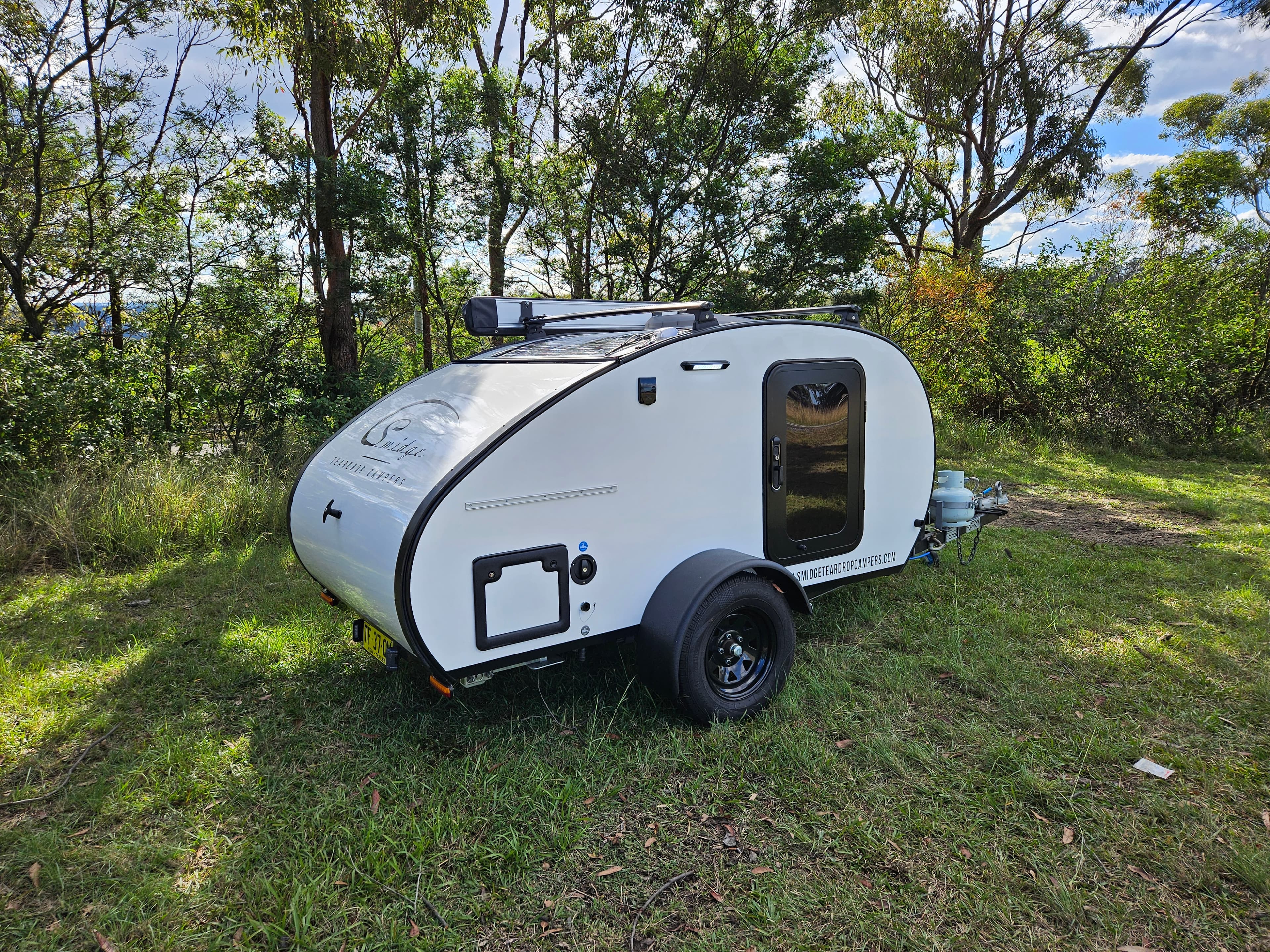 2024 Smidge Breeze teardrop trailer — passenger side exterior in excellent condition