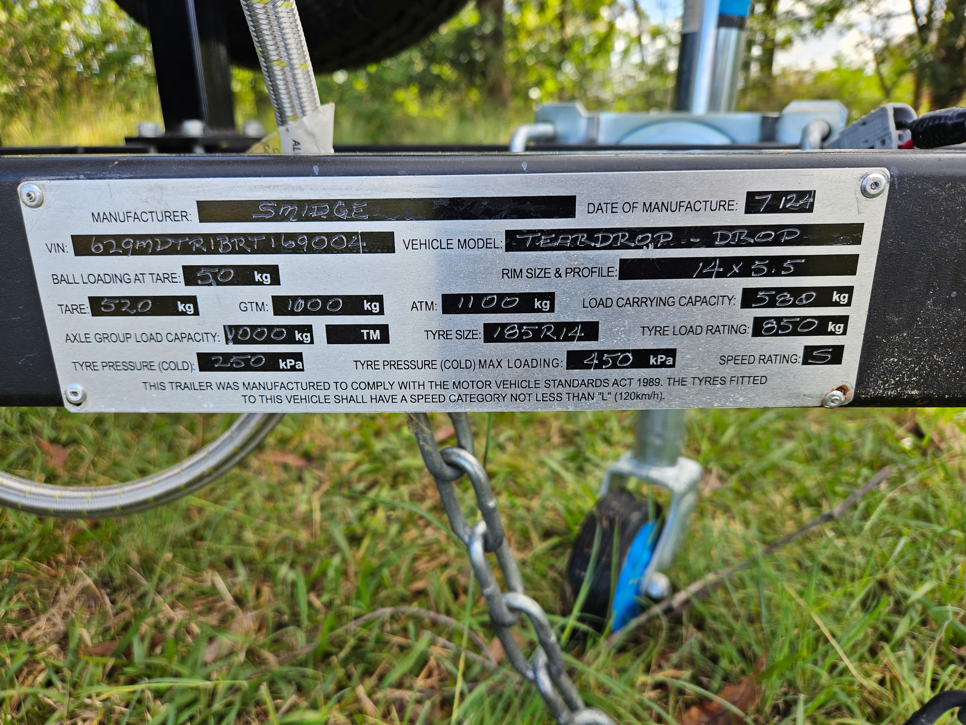 2024 Smidge Breeze — compliance plate confirming July 2024 manufacture by Smidge Teardrop Campers