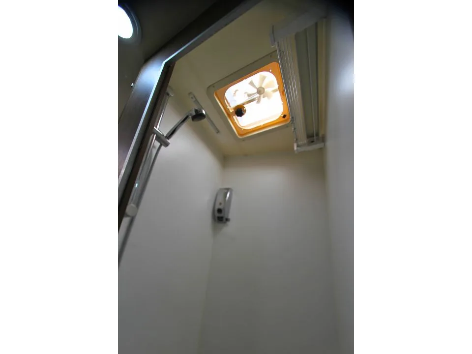 2011 Suncamper Sydney motorhome — interior shower cubicle with overhead vent fan