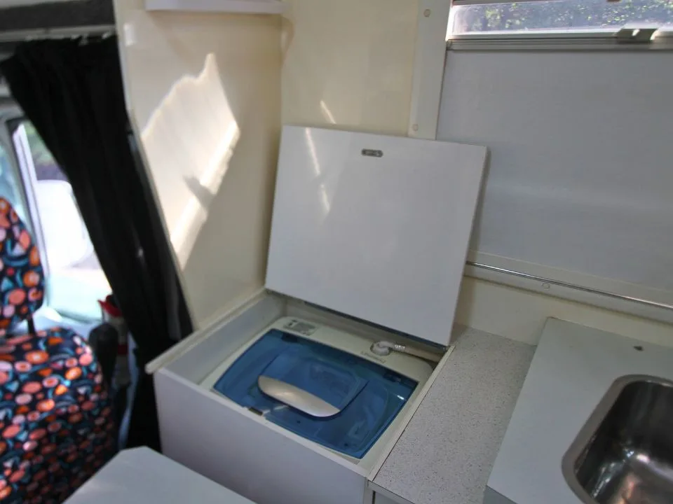 2011 Suncamper Sydney motorhome — interior countertop washing machine