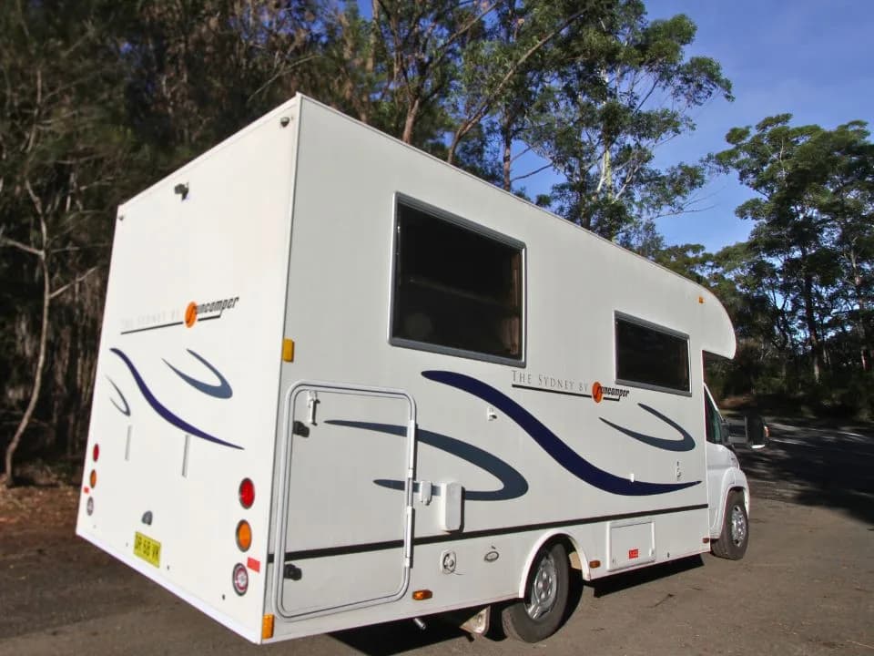 2011 Suncamper Sydney motorhome — rear three-quarter exterior showing Suncamper branding