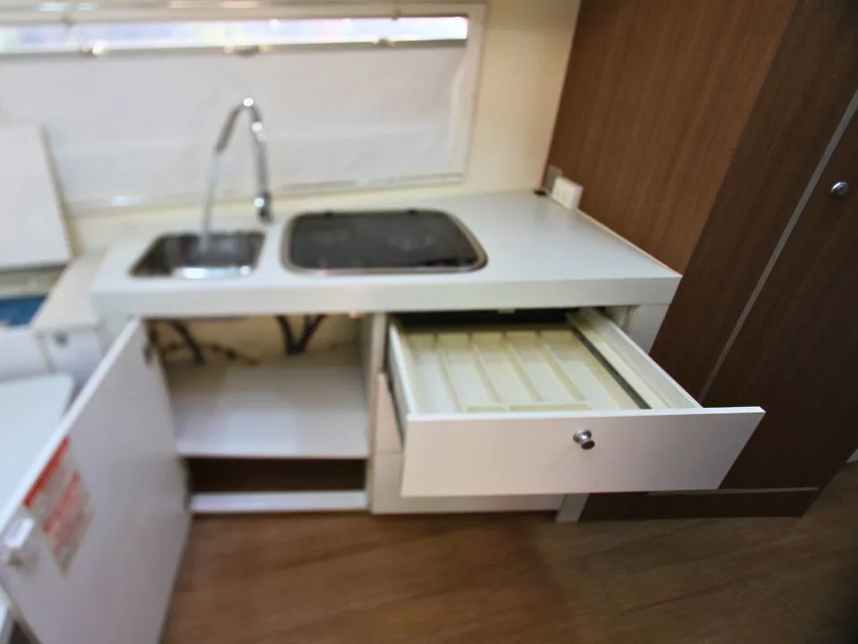 2011 Suncamper Sydney motorhome — interior kitchen drawer storage below sink