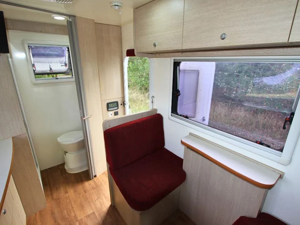 2015 Suncamper Sherwood 4x4 Twin motorhome — interior bathroom viewed from dinette