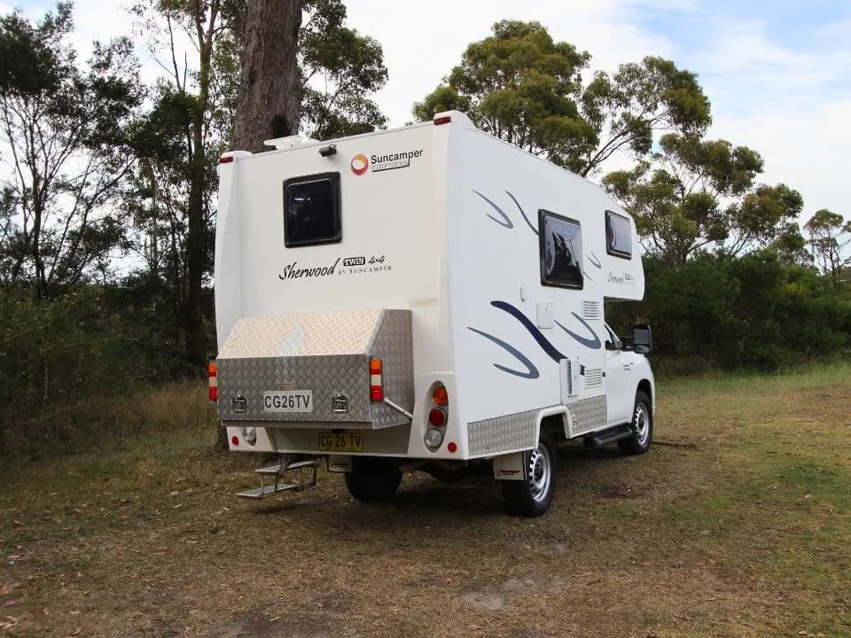 2015 Suncamper Sherwood 4x4 Twin motorhome — rear three-quarter exterior, alternate angle