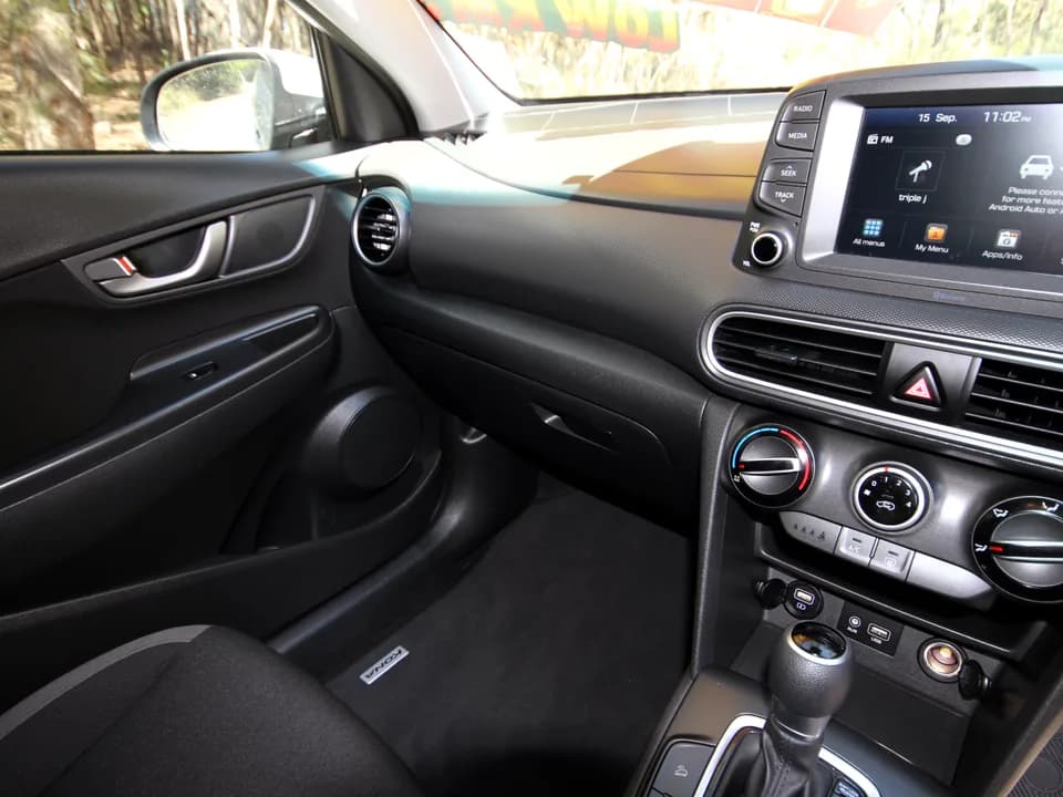 2019 Hyundai Kona Go interior — passenger side dashboard and glovebox