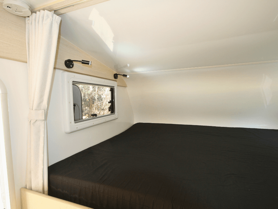 2024 Suncamper Sherwood E-2 interior — over-cab bed