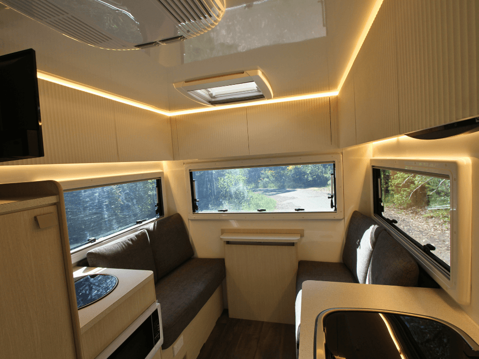 2024 Suncamper Sherwood E-2 interior — lounge and rear seating area