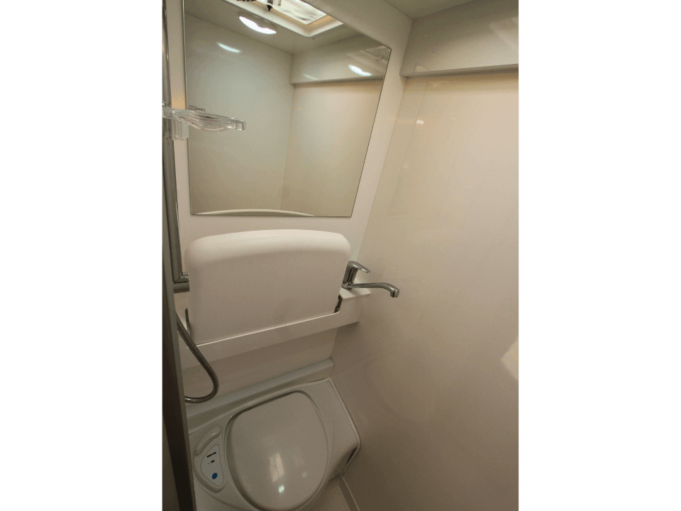 2024 Suncamper Sherwood E-2 interior — bathroom with toilet and shower