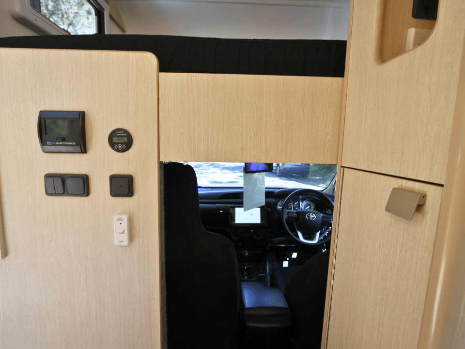 2024 Suncamper Sherwood E-2 interior — cab connection and control panel